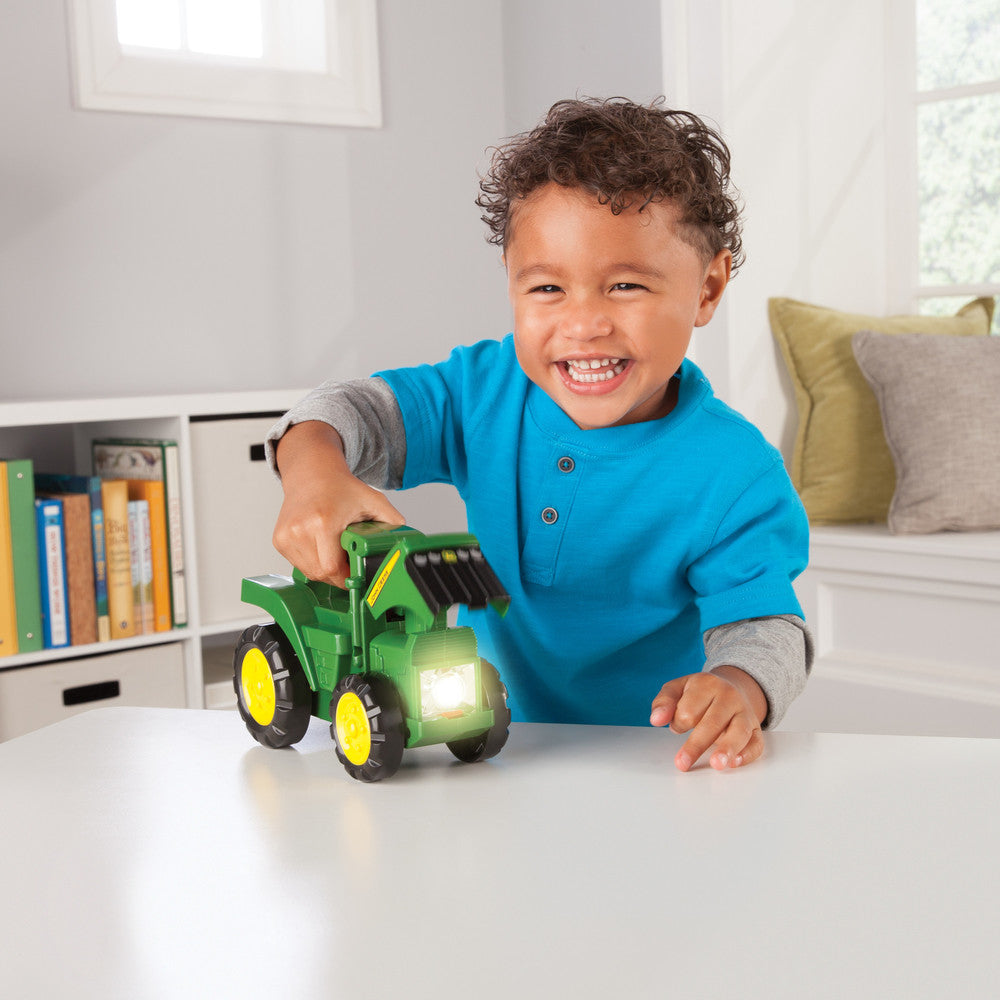 TOMY John Deere traktor z latarką z dźw 35083