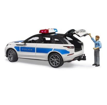 Range Rover Velar policyjny z figurką policjanta