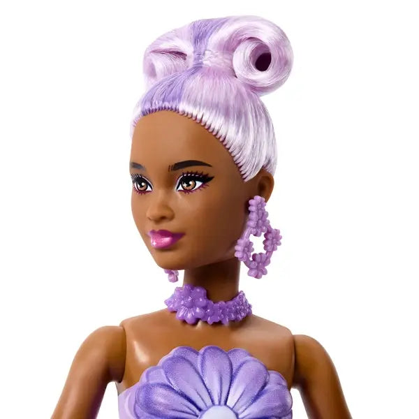 Barbie - Kwiatowa niespodzianka, Fioletowa stokrotka