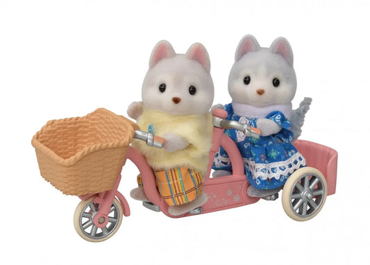 Sylvanian pieski husky na rowerze